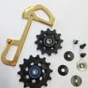Sram XX1 Eagle Gold Schaltwerkrädchen/Inneres Leitblech-Set